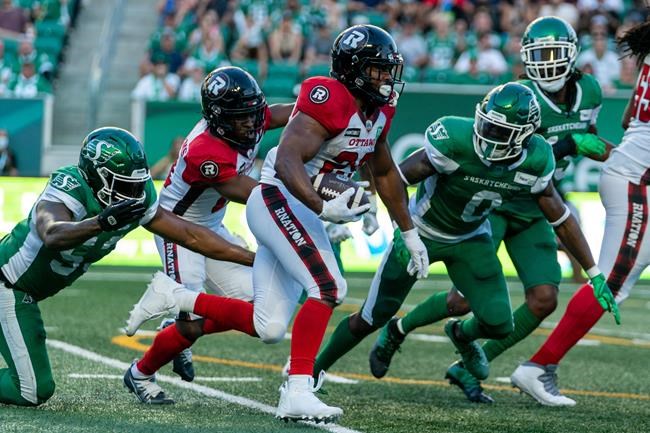 Taquan Mizzell's TDs lead Lions past Elks 37-29; B.C. clinches playoff  berth - The Globe and Mail