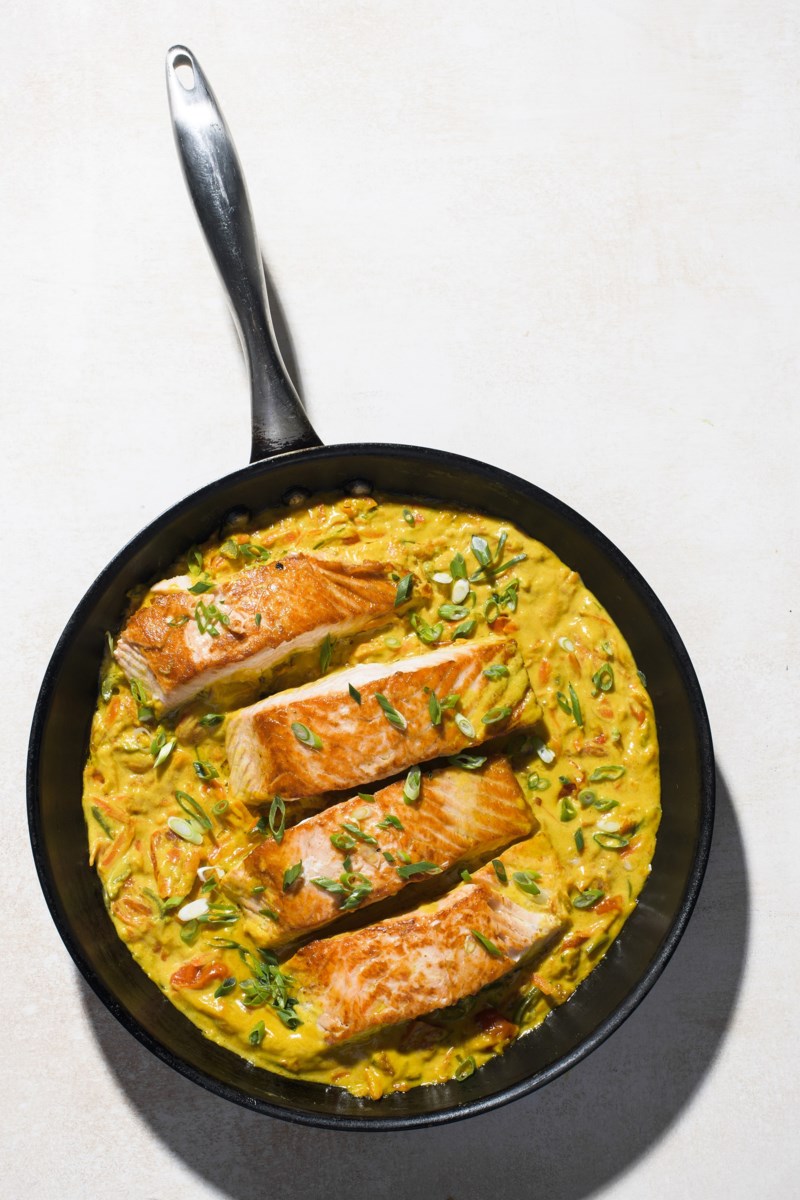 India meets East Africa in 1-skillet curried salmon filets