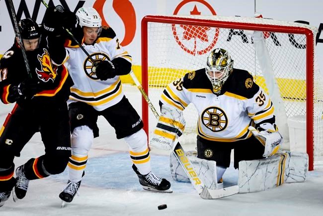 Bruins win 8th straight, Ullmark frustrates Flames with 54 saves