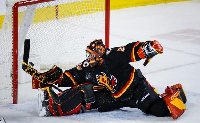 Calgary Flames coach Darryl Sutter wants more from his goaltenders -  