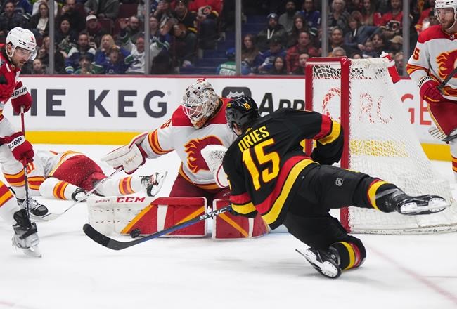 Canucks rally from three-goal deficit but fall short in overtime