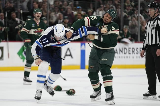 Jets clinch playoff spot with feisty 3-1 win over Wild