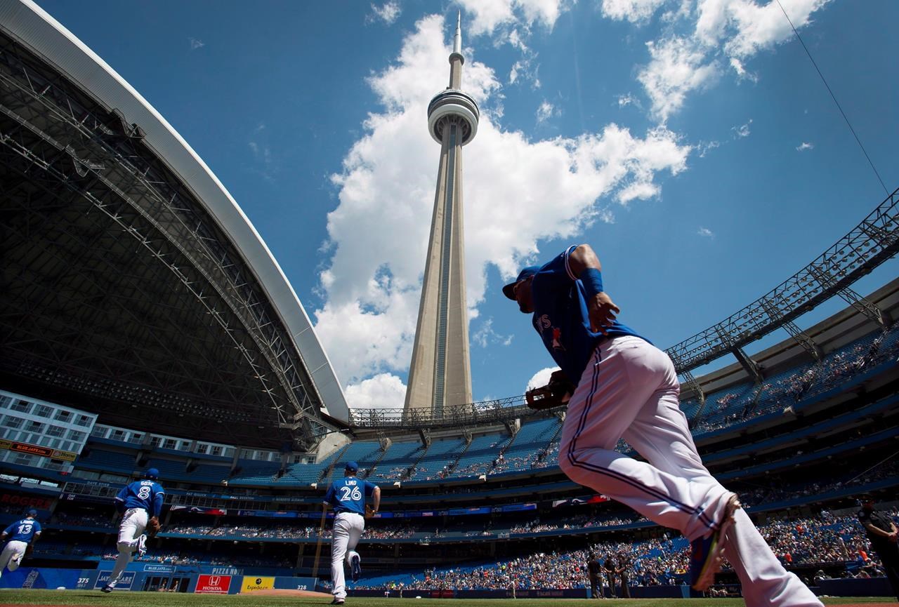 Rogers Centre roof open for Jays-Tigers game; earliest opening in franchise  history 