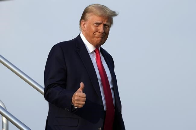 Trump arrives in Georgia to surrender on charges he sought to overturn his 2020 loss