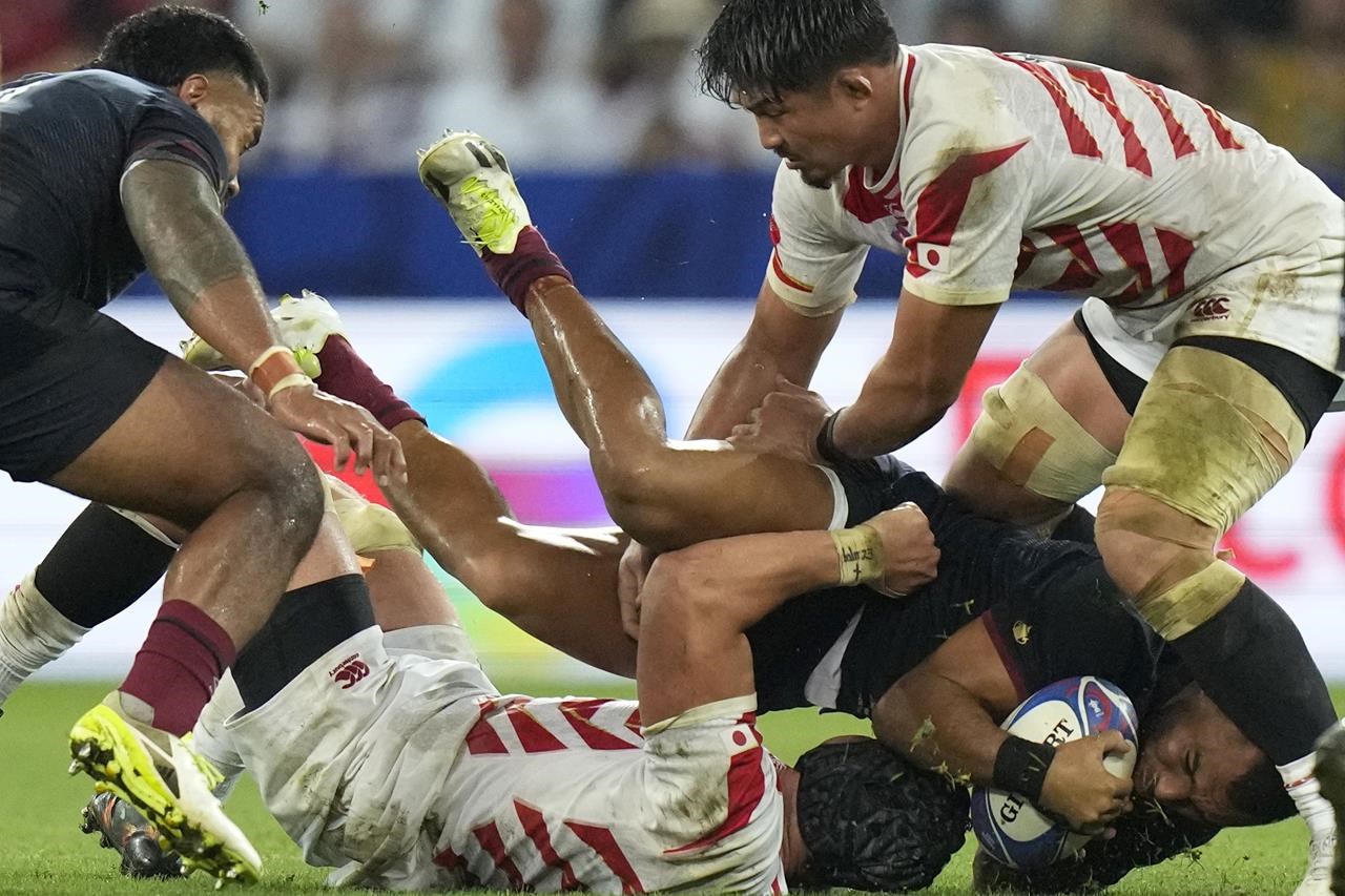 England grind Japan down and cut loose late in second Rugby World Cup win