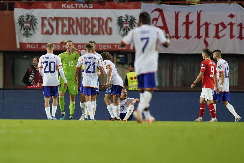 Sabitzer's penalty sends Austria to European Championship in day overshadowed by Brussels shooting