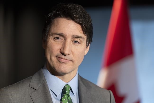 Trudeau says job of prime minister "crazy," but he's determined to continue