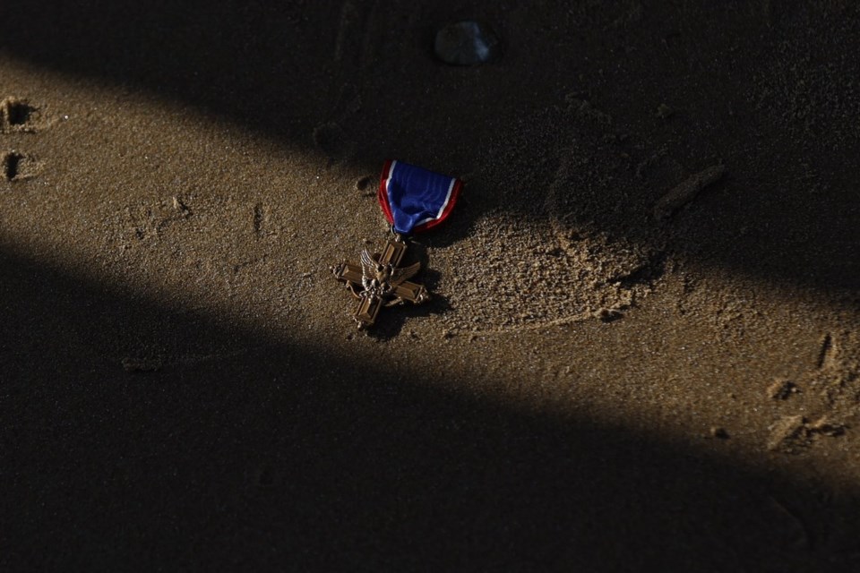 Black D-Day combat medic's long-denied medal tenderly laid on Omaha Beach where he bled, saved lives