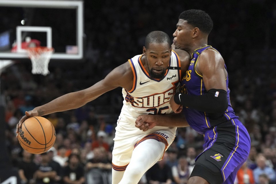 Booker scores 33 Durant adds 30 as the Suns rally for 109 105 win and hand Lakers first loss Victoria Times Colonist