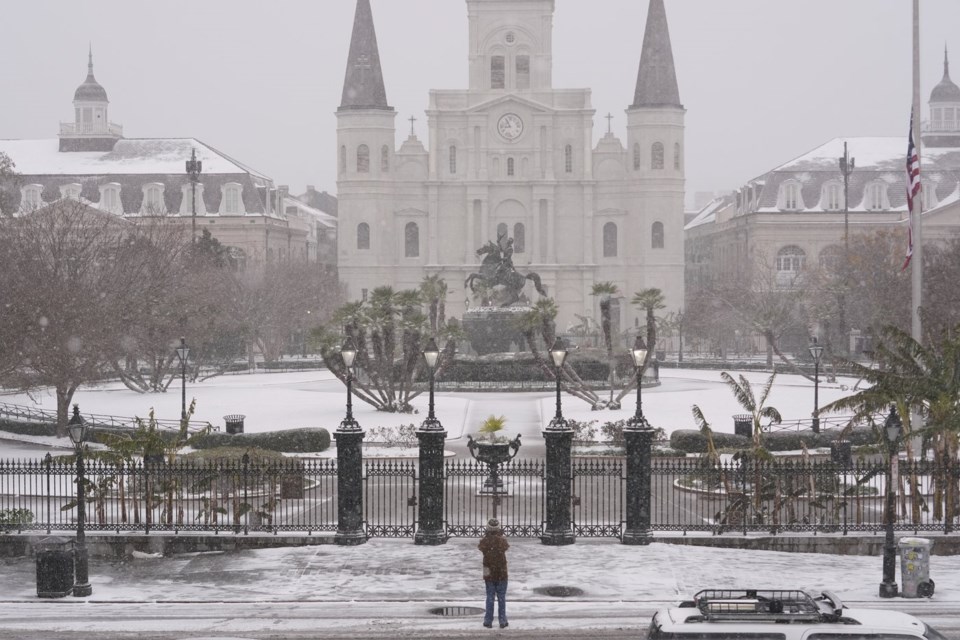 A frigid storm drops rare snow on Houston and New Orleans as Florida