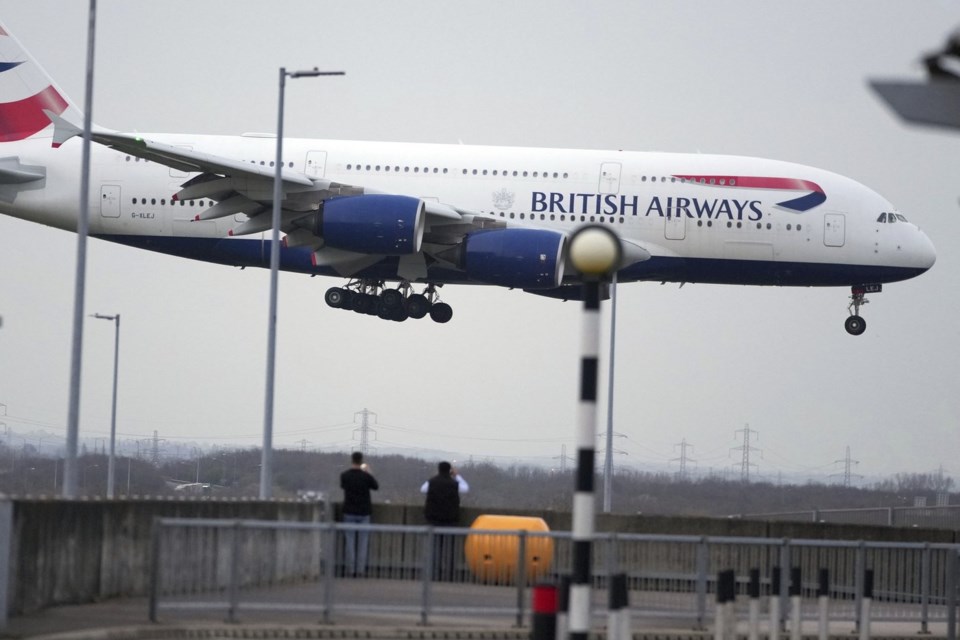 First plane lands at London