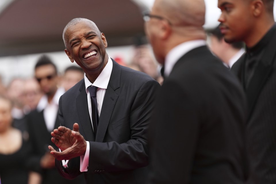 Denzel Washington receives surprise honorary Palme d'Or at Cannes premiere for 'Highest 2 Lowest'