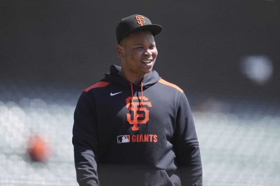 San Francisco Giants' Rafael Devers walks onto the field before a baseball game against the Cleveland Guardians in San Francisco, Thursday, June 19, 2025. (AP Photo/Jeff Chiu)