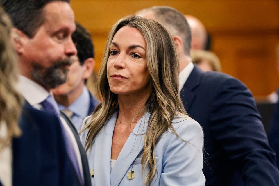 Karen Read watches jurors enter the courtroom to resume deliberations during her trial at Norfolk Superior Court, Wednesday, June 18, 2025, in Dedham, Mass. (Greg Derr/The Patriot Ledger via AP, Pool)