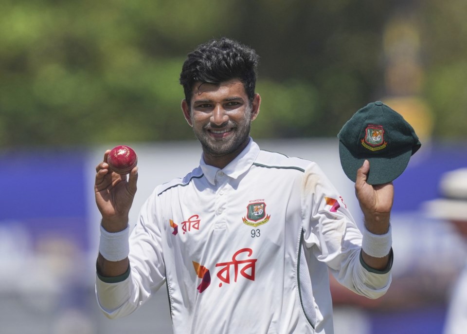 Bangladesh's Nayeem Hasan acknowledges after taking five Sri Lankan wickets during day four of the first cricket test match between Sri Lanka and Bangladesh in Galle, Sri Lanka, Friday, June 20, 2025. (AP Photo/Eranga Jayawardena)