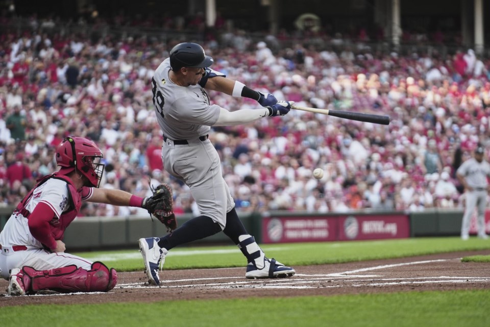New York Yankees' Aaron Judge strikes out during the first inning of a baseball game against the Cincinnati Reds, Tuesday, June 24, 2025, in Cincinnati. (AP Photo/Joshua A. Bickel)