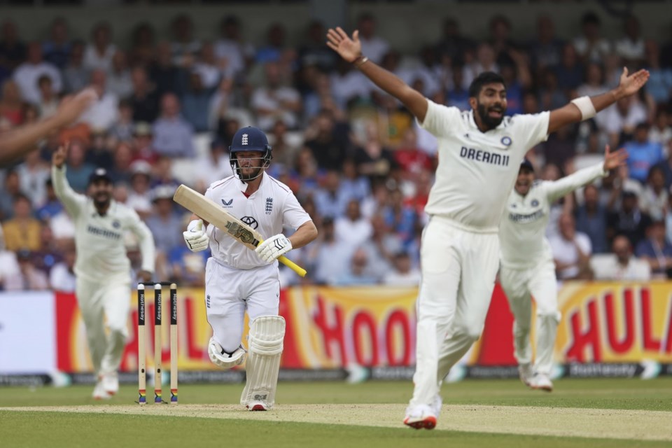 India's Jasprit Bumrah, right, appeals unsuccessfully for the wicket of England's Ben Duckett, center, on day two of the first cricket test match between England and India at Headingley in Leeds, England, Saturday, June 21, 2025, (AP Photo/Scott Heppell)