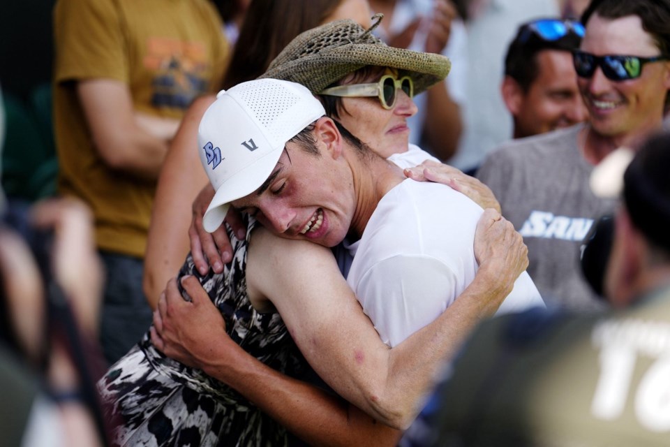 Britain's Oliver Tarvet celebrates winning his match against Switzerland's Leandro Riedi in the first round of the men’s singles at the Wimbledon Tennis Championships in London, Monday, June 30, 2025. ( Jordan Pettitt/PA via AP)