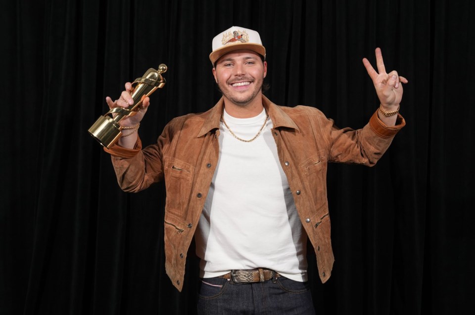 Josh Ross poses for photos after winning Country Album of the Year during the Juno Awards in Vancouver, B.C., Sunday, March 30, 2025. THE CANADIAN PRESS/Darryl Dyck