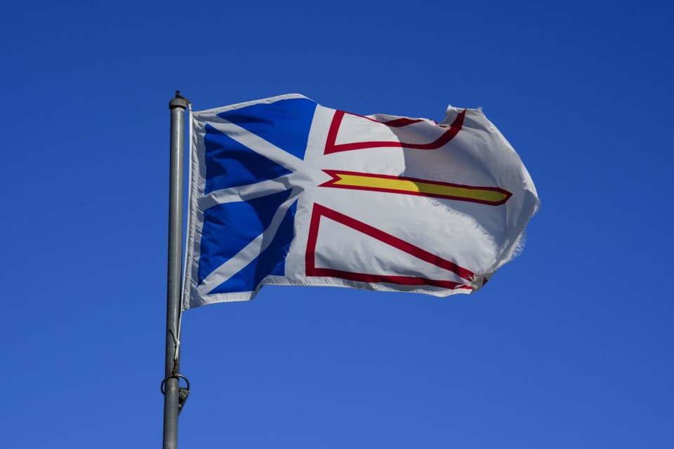 A Newfoundland flag flies in the wind in Rocky Harbour, N.L., on Wednesday, Sept. 4, 2024. THE CANADIAN PRESS/Sean Kilpatrick