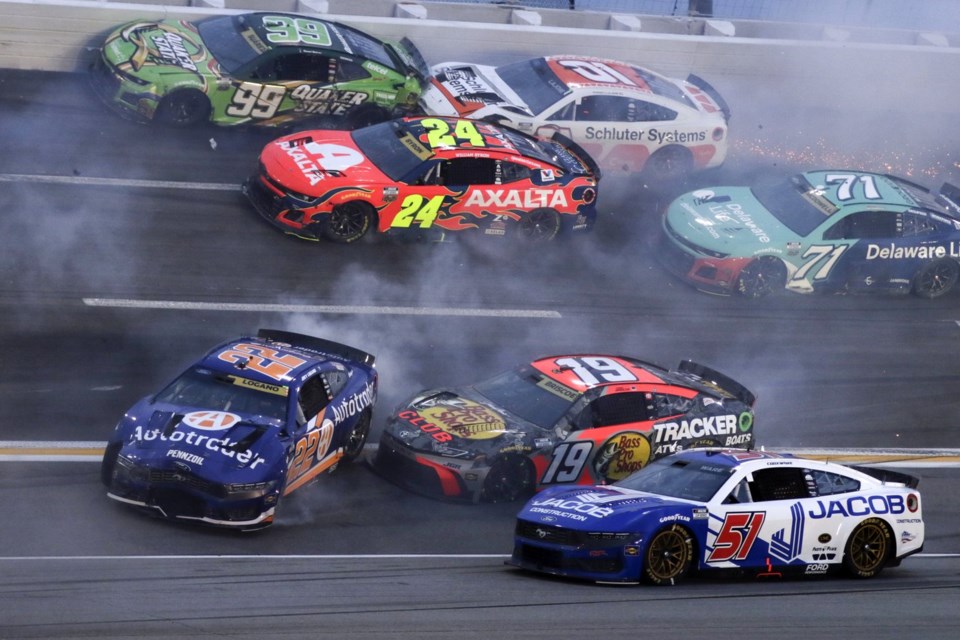 Driver Joey Logano (22) along with over twenty other drivers get tangled up in a wreck in turn three of lap sixty nine during a NASCAR Cup Series auto race, Saturday, June 28, 2025, in Hampton, Ga. (AP Photo/Russell Norris)