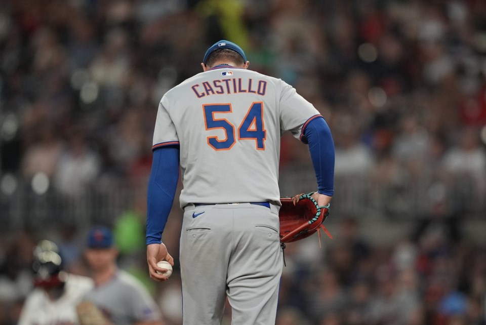 New York Mets pitcher José Castillo (54) works on the mound against the Atlanta Braves in the sixth inning of a baseball game, Wednesday, June 18, 2025, in Atlanta. (AP Photo/Mike Stewart)