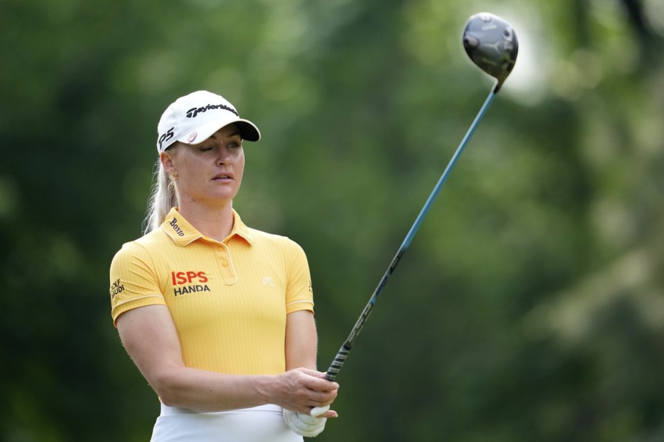 FILE - Charley Hull, of England, prepares to hit on the 13th hole during the first round of the Chevron Championship LPGA golf tournament April 24, 2025, in The Woodlands, Texas. (AP Photo/Ashley Landis, File)
