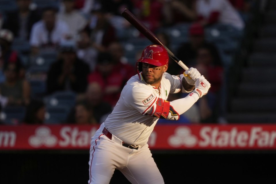 FILE - Los Angeles Angels' Yoan Moncada bats during the first inning of a baseball game against the Miami Marlins, May 23, 2025, in Anaheim, Calif. (AP Photo/Mark J. Terrill, File)