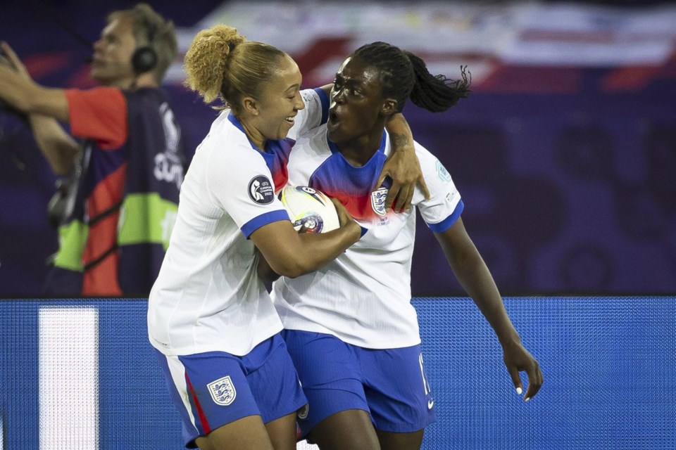 England's Michelle Agyemang, right, celebrates with Lauren James after scoring their second goal during the Women's Euro 2025 quarterfinals soccer match between Sweden and England at Stadion Letzigrund in Zurich, Switzerland, Thursday, July 17, 2025. (Michael Buholzer/Keystone via AP)