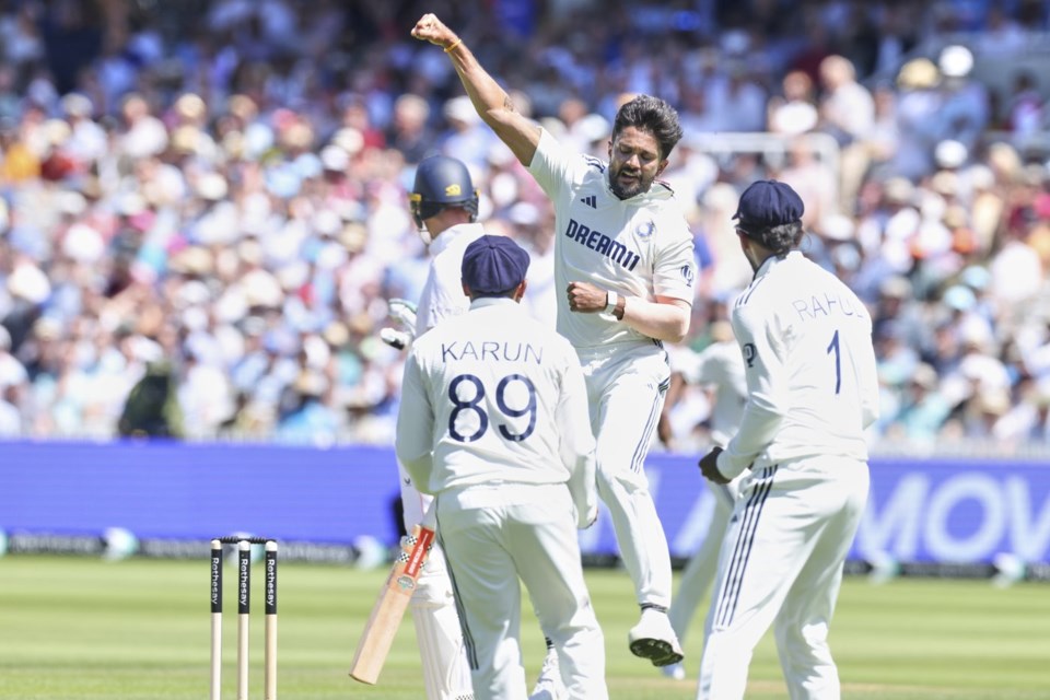 India's Nitish Kumar Reddy celebrates the dismissal of England's Ben Duckett during the third cricket test match between England and India at Lord's cricket ground in London, Thursday, July 10, 2025. (AP Photo/Richard Pelham)