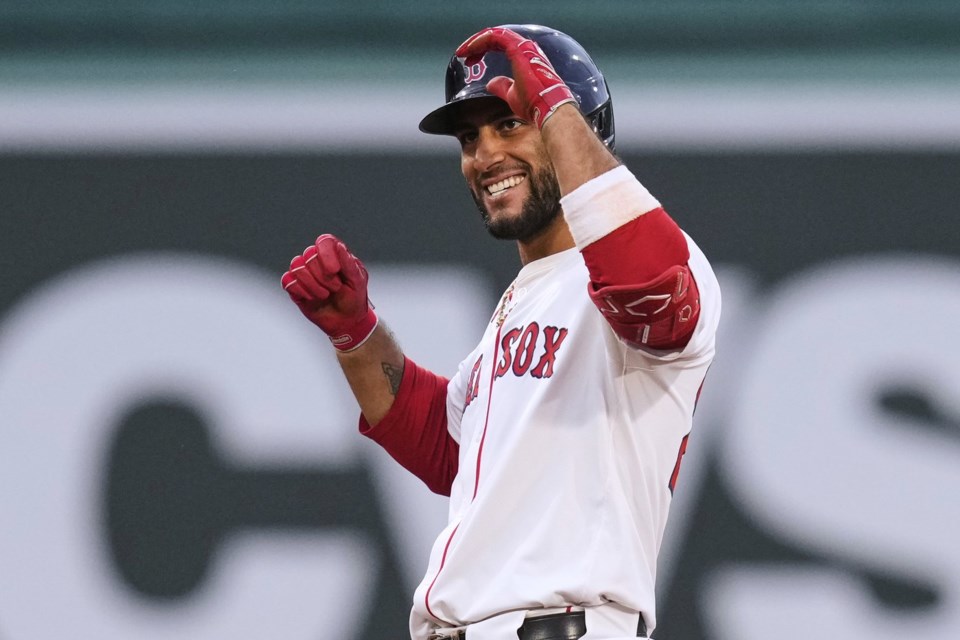 Boston Red Sox's Abraham Toro celebrates after his two-RBI double during the second inning of a baseball game against the Colorado Rockies at Fenway Park, Monday, July 7, 2025, in Boston. (AP Photo/Charles Krupa)