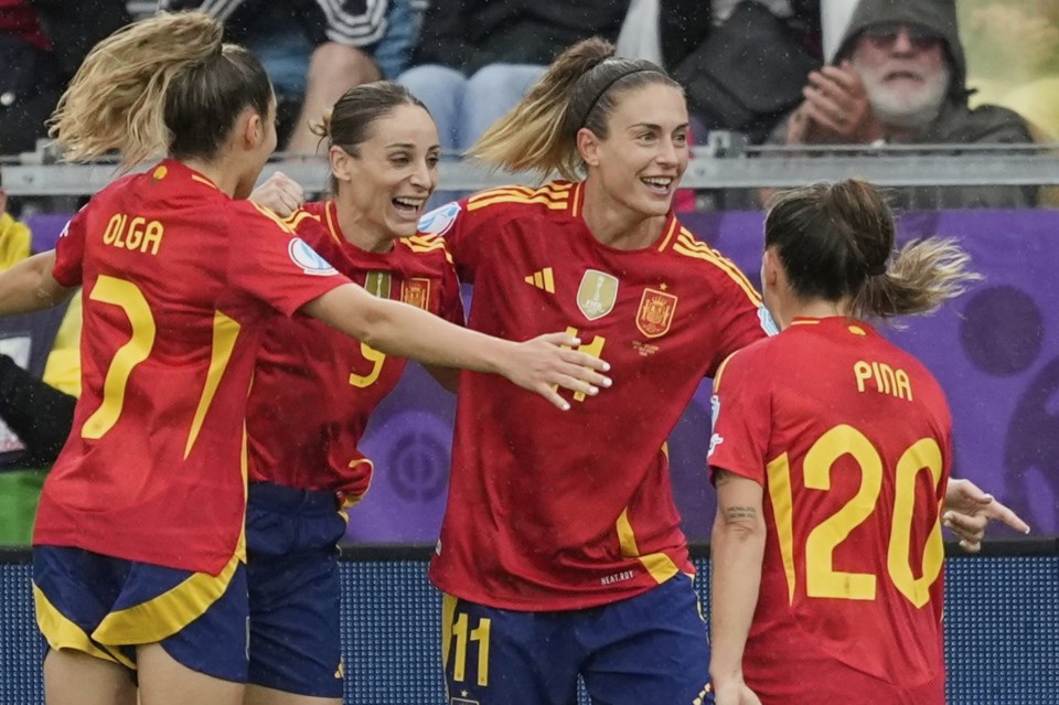 Spain's Alexia Putellas (11) celebrates after scoring her side's opening goal during the Euro 2025, group B, soccer match between Spain and Belgium at Arena Thun in Thun, Switzerland, Monday, July 7, 2025. (AP Photo/Martin Meissner)