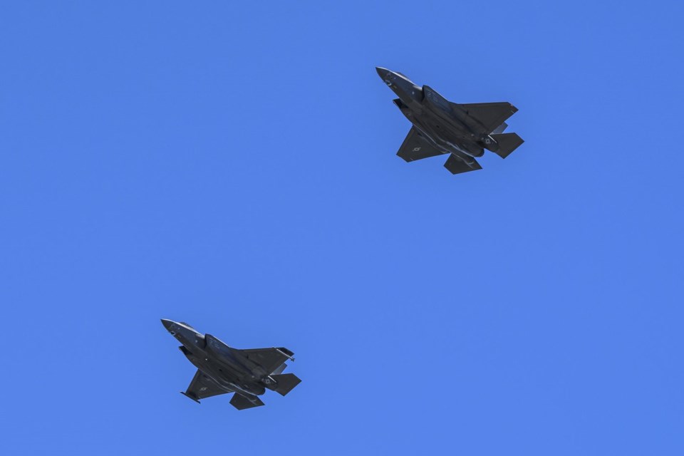 Two F-35 Lightning fighter aircraft participate in a flypast celebrating the RCAF centennial on Canada Day, Monday, July 1, 2024. THE CANADIAN PRESS/Justin Tang