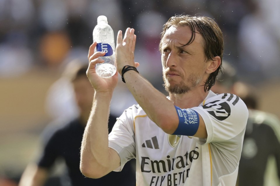Real Madrid's Luka Modric applauds after the Club World Cup semifinal soccer match between PSG and Real Madrid in East Rutherford, N.J., Wednesday, July 9, 2025. (AP Photo/Adam Hunger)