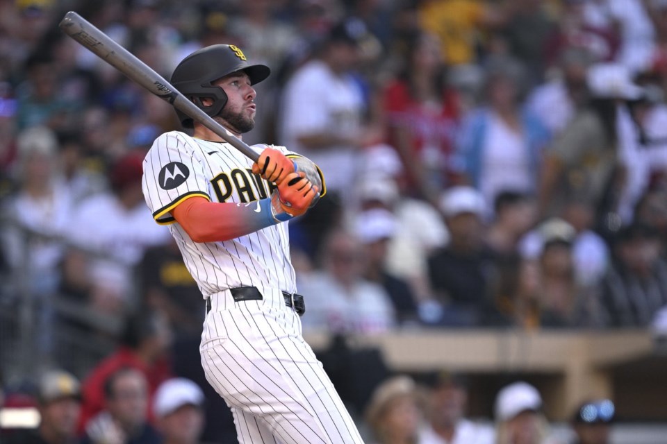 San Diego Padres' Jackson Merrill watches his home run during the sixth inning of a baseball game against the Philadelphia Phillies, Saturday, July 12, 2025, in San Diego. (AP Photo/Orlando Ramirez)