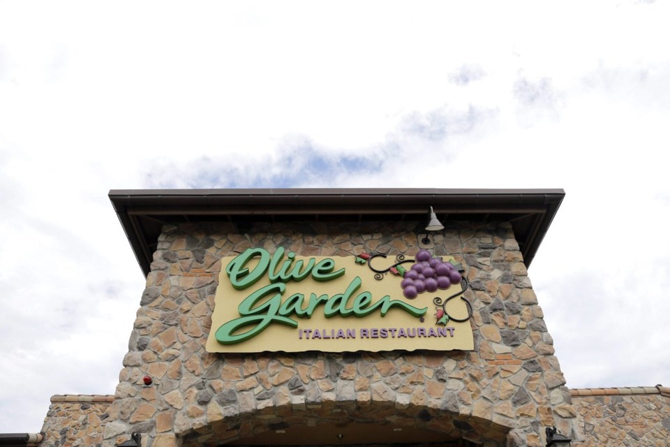 FILE - This Monday, June 27, 2016, file photo shows an Olive Garden restaurant in Methuen, Mass. (AP Photo/Elise Amendola, File)