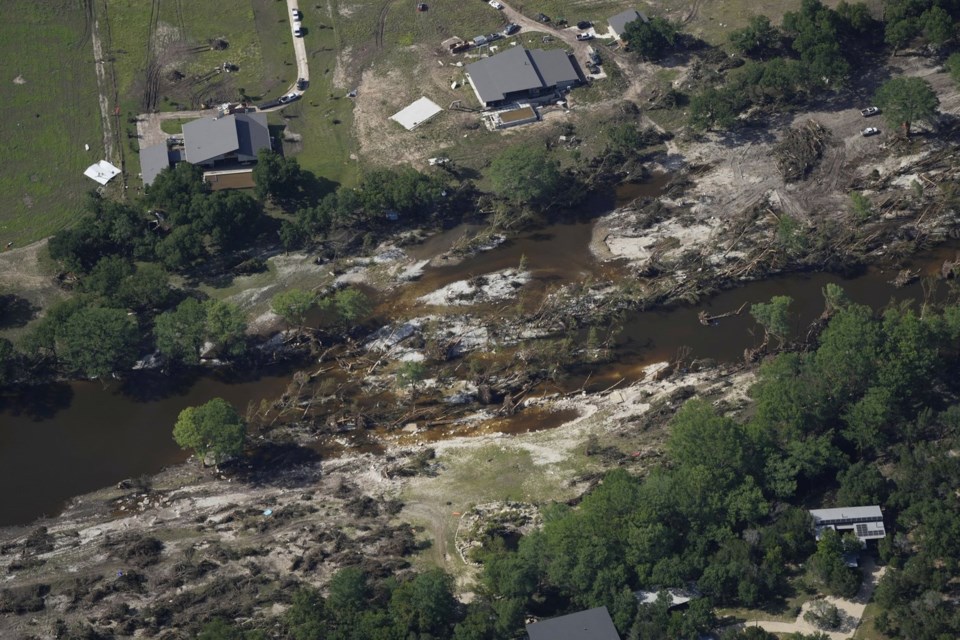 Damage is seen next to the Guadalupe River on Tuesday, July 8, 2025, after a flash flood swept through the area near Ingram, Texas. (AP Photo/Ashley Landis)