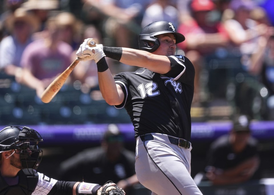 Chicago White Sox's Colson Montgomery singles against Colorado Rockies starting pitcher Chase Dollander in the second inning of a baseball game Sunday, July 6, 2025, in Denver. (AP Photo/David Zalubowski)
