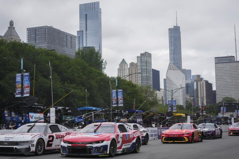 Drivers race in a NASCAR Cup Series auto race at the Grant Park 165 , Sunday, July 6, 2025, in Chicago. (AP Photo/Erin Hooley)