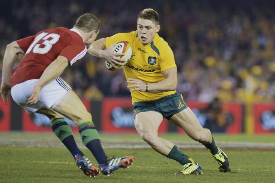 FILE - British and Irish Lions' Brian O'Driscoll, left, tackles Australia's James O'Connor during their rugby union test match in Melbourne, Australia, Saturday, June 29, 2013. (AP Photo/Mal Fairclough,File)