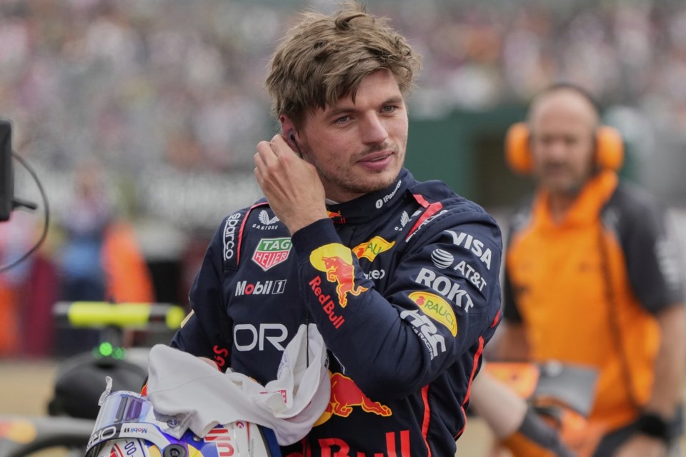 Red Bull driver Max Verstappen of the Netherlands reacts after taking the pole position during the qualifying for the British Formula One Grand Prix in Silverstone, England, Saturday, July 5, 2025. (AP Photo/Darko Bandic)