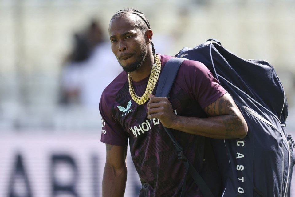 England's Jofra Archer walks onto the field before the start of play on day two of the second cricket test match between England and India at Edgbaston in Birmingham, England, Thursday, July 3, 2025. (AP Photo/Scott Heppell)
