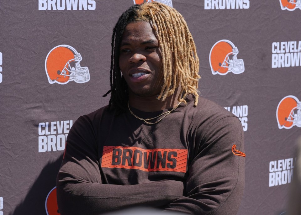 FILE - Cleveland Browns running back Quinshon Judkins speaks during a news conference at the NFL football team's rookie minicamp in Berea, Ohio, May 9, 2025. (AP Photo/Sue Ogrocki, file)