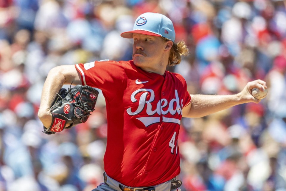 Cincinnati Reds starting pitcher Andrew Abbott throws in the first inning of a baseball game against the Philadelphia Phillies, Friday, July 4, 2025, in Philadelphia. (AP Photo/Laurence Kesterson)