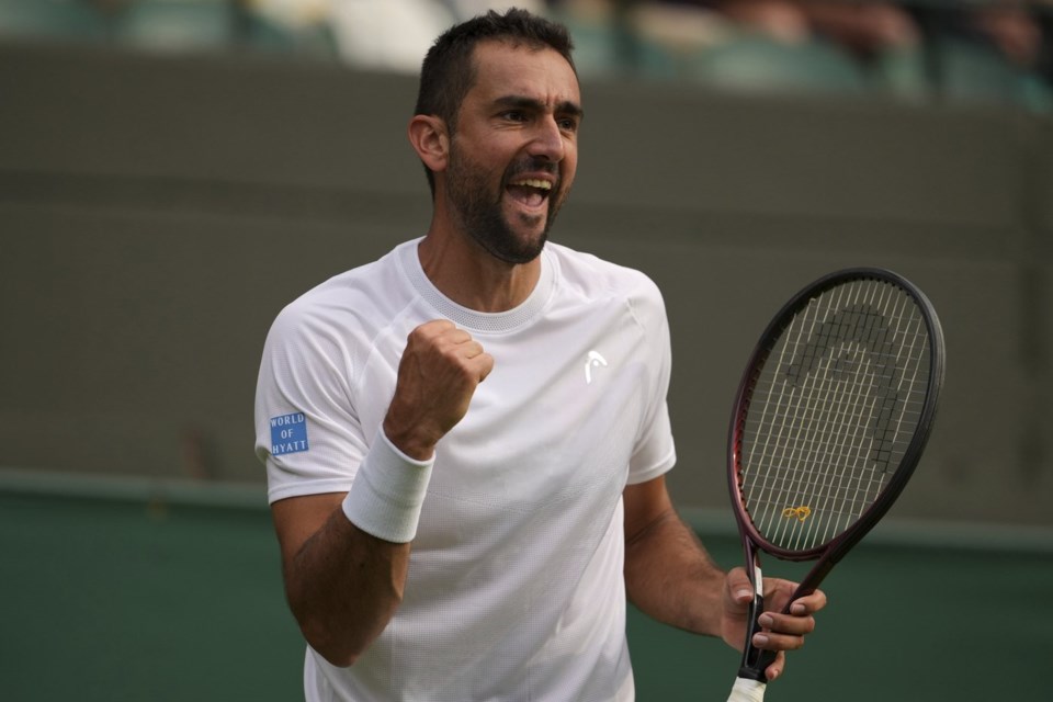 Marin Cilic of Croatia reacts during his second round men's singles match against Jack Draper of Britain at the Wimbledon Tennis Championships in London, Thursday, July 3, 2025.(AP Photo/Kin Cheung)