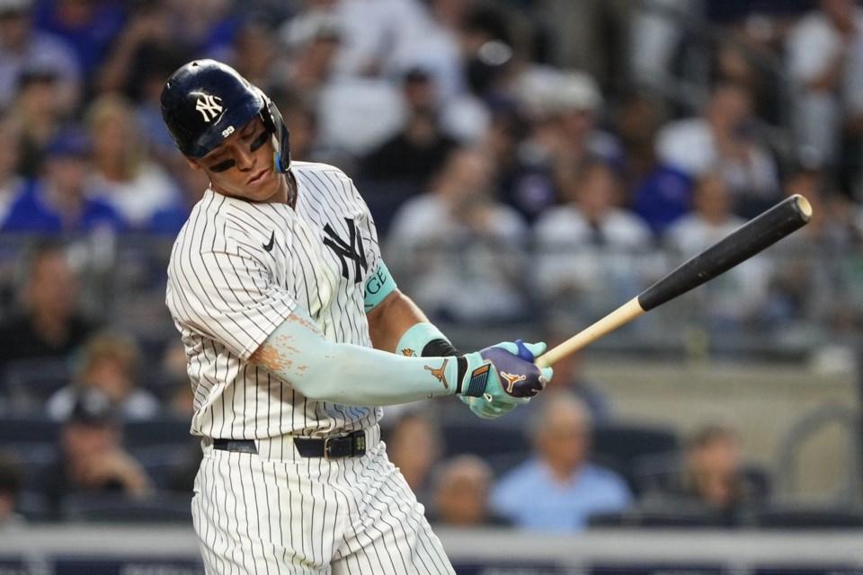 New York Yankees' Aaron Judge strikes out during the fifth inning of a baseball game against the Chicago Cubs, Friday, July 11, 2025, in New York. (AP Photo/Yuki Iwamura)