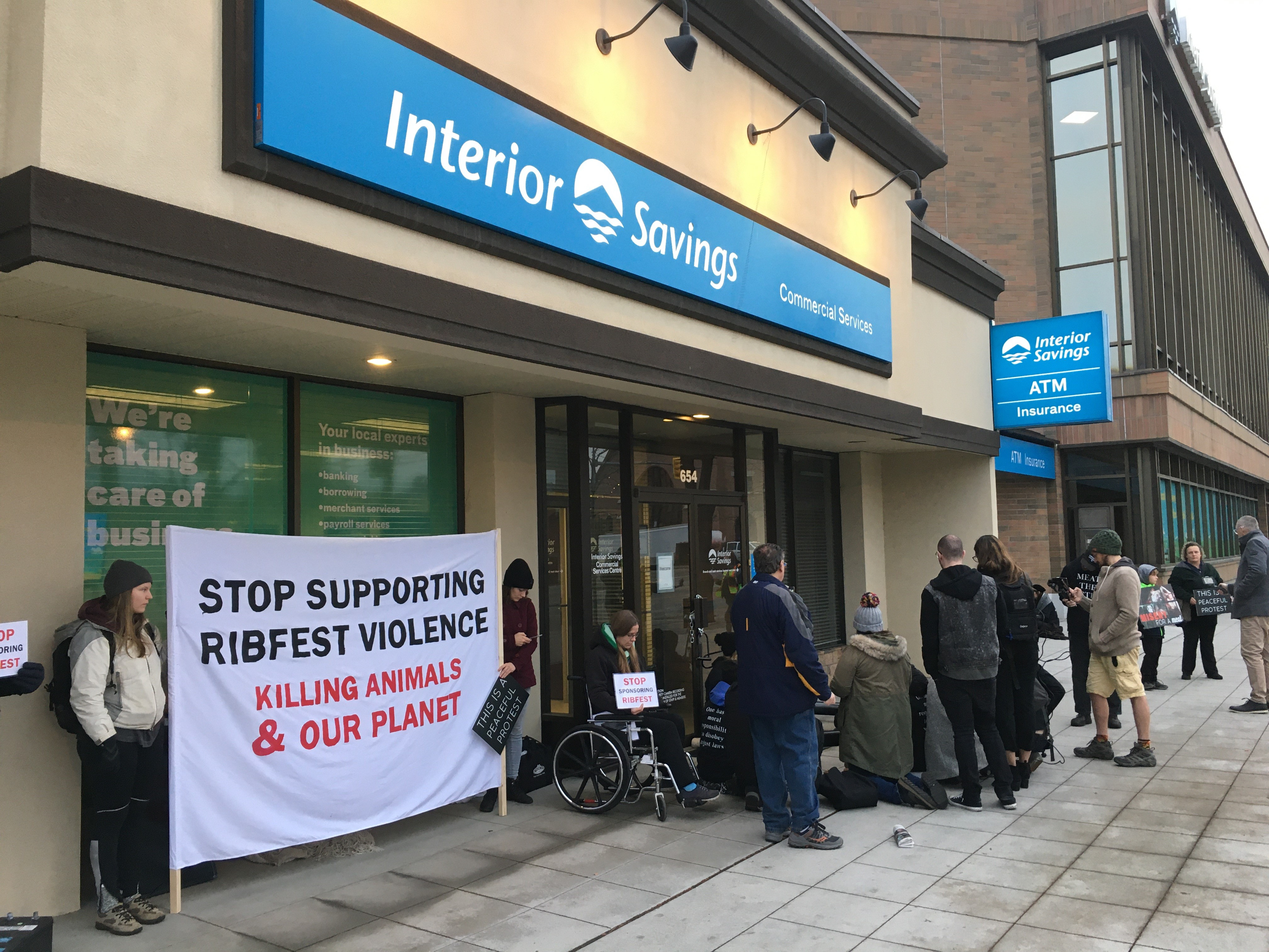 Animal Activists Chain Themselves To Kelowna Building