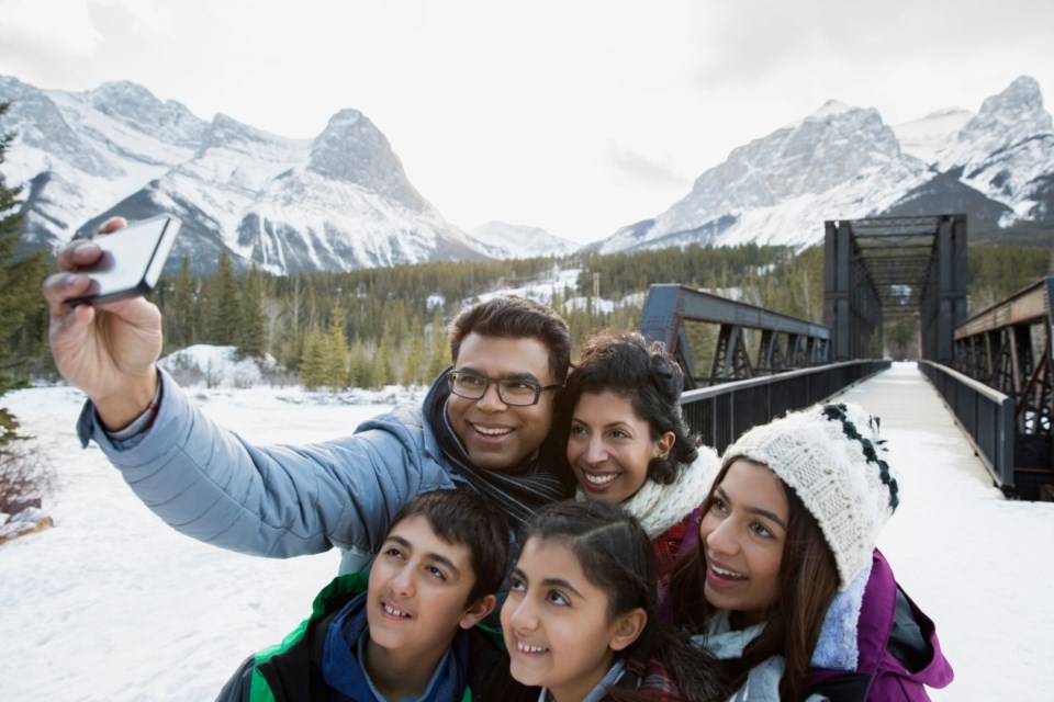 family-selfie-mountains-outside