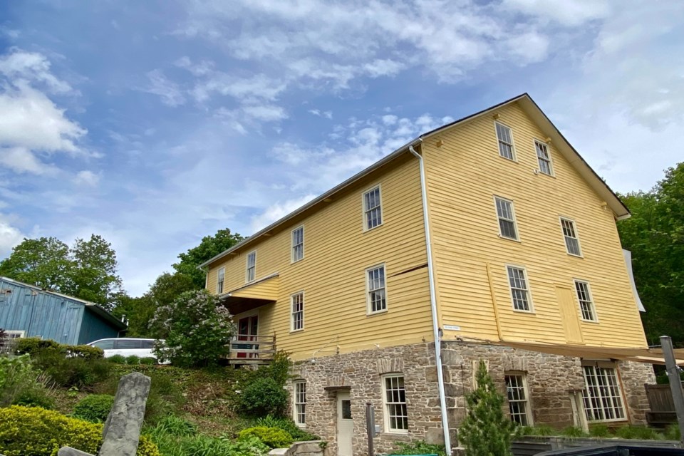 The iconic yellow building is part of the Williams Mill Creative Art Studios in the Glen.