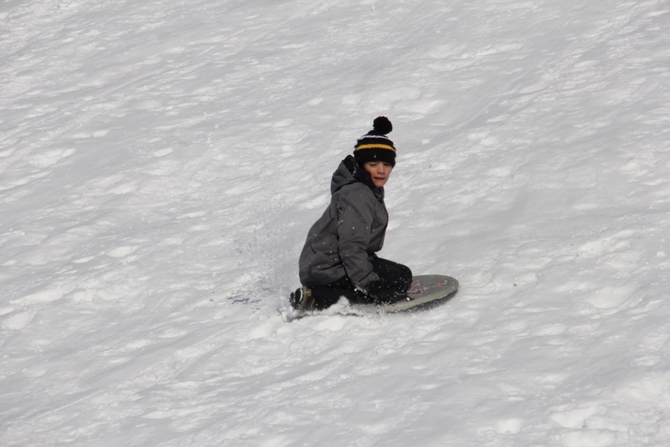 USED 2019-03-14goodmorning  3 Sliding on a sunny day. Photo by Brenda Turl for BayToday.